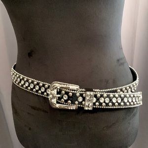 Stunning black leather belt covered with rhinestone circles. Size M/L.